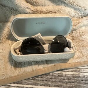 Oakley Black Sunglasses with Round Lenses